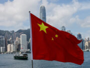 Taron China Da Afirka Zai Kara Tasirinta A Nahiyar-Masana The Chinese national flag is seen in front of the financial district Central on the Chinese National Day in Hong Kong